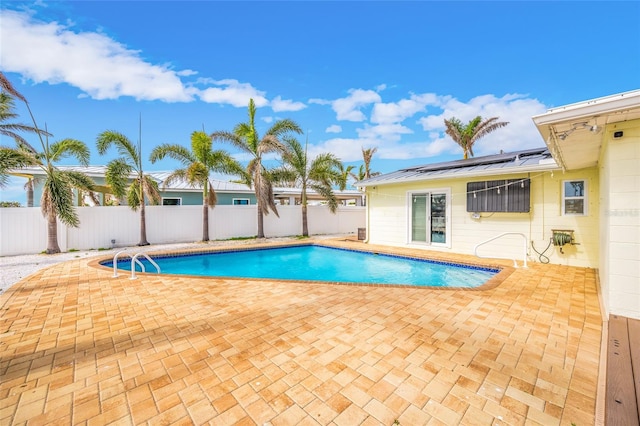 view of pool with a fenced in pool, a fenced backyard, and a patio area