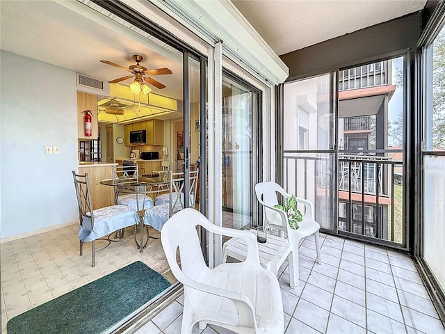 8174 Terrace Garden Dr N Unit 307, Saint Petersburg, FL 33709 - sunroom / solarium with ceiling fan