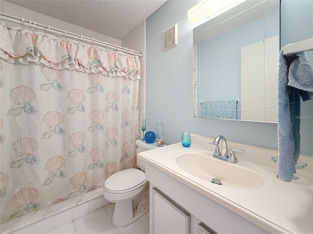 8174 Terrace Garden Dr N Unit 307, Saint Petersburg, FL 33709 - bathroom featuring walk in shower, toilet, a textured ceiling, vanity, and tile patterned flooring
