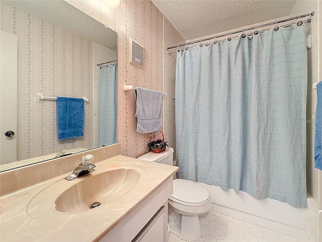 8174 Terrace Garden Dr N Unit 307, Saint Petersburg, FL 33709 - full bathroom with shower / tub combo with curtain, tile patterned flooring, vanity, toilet, and a textured ceiling