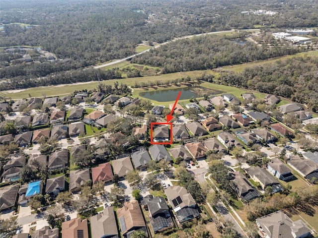 aerial view with a residential view and a water view