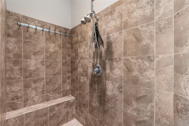 details featuring a tile shower