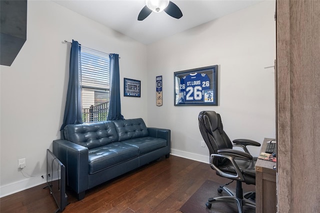 office space with a ceiling fan, baseboards, and wood finished floors