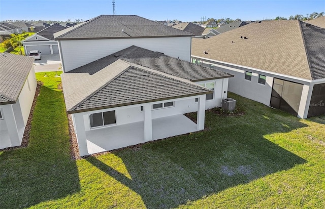 birds eye view of property with a residential view