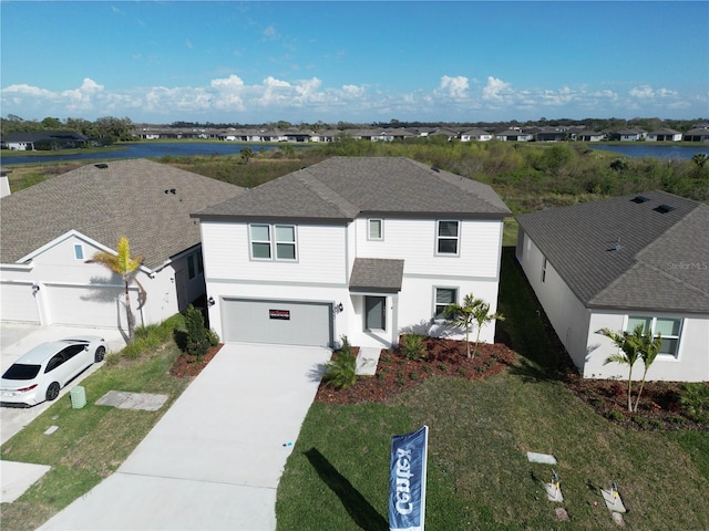 traditional home with roof with shingles, fence, a garage, a residential view, and driveway