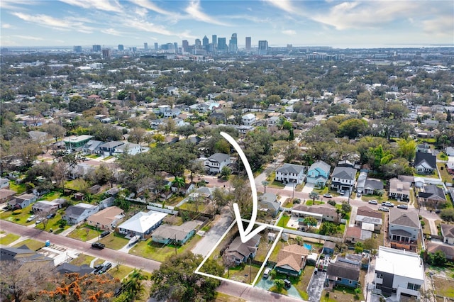 birds eye view of property featuring a view of city