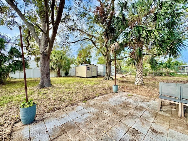 view of patio / terrace with a storage shed