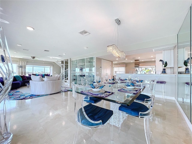 dining space with a ceiling fan, recessed lighting, and visible vents