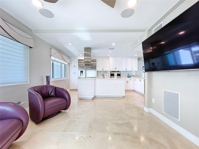 living room featuring recessed lighting, visible vents, and baseboards