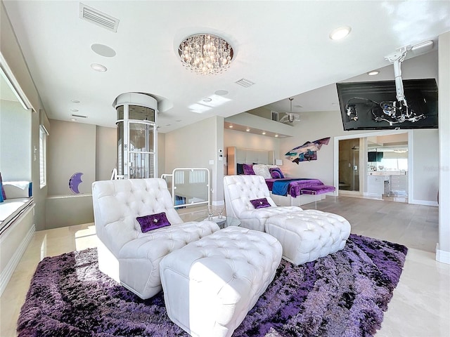 living area featuring recessed lighting, visible vents, and baseboards