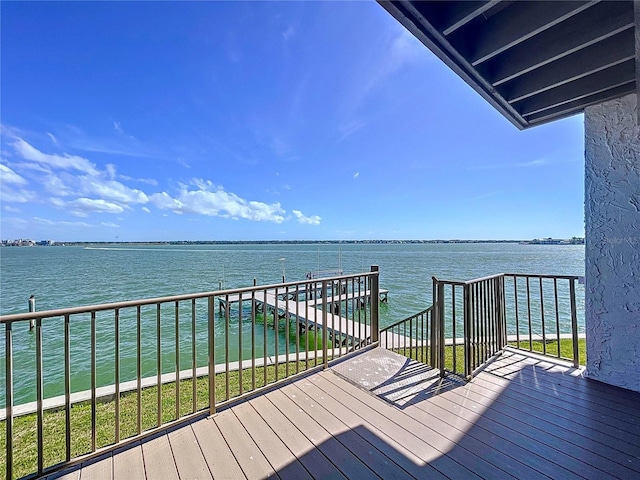 wooden terrace with a water view