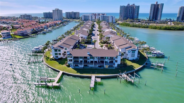 aerial view featuring a view of city and a water view