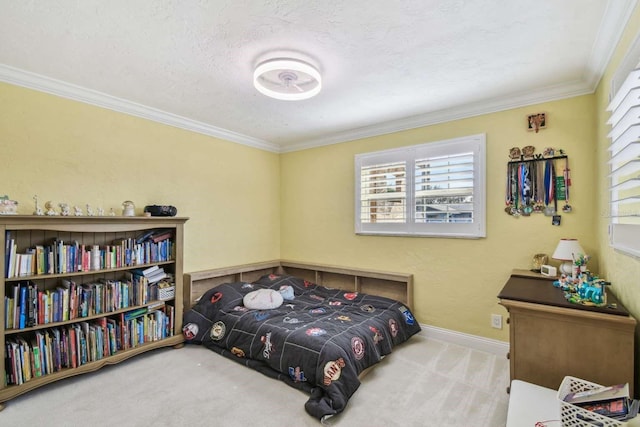 carpeted bedroom with ornamental molding and a textured ceiling