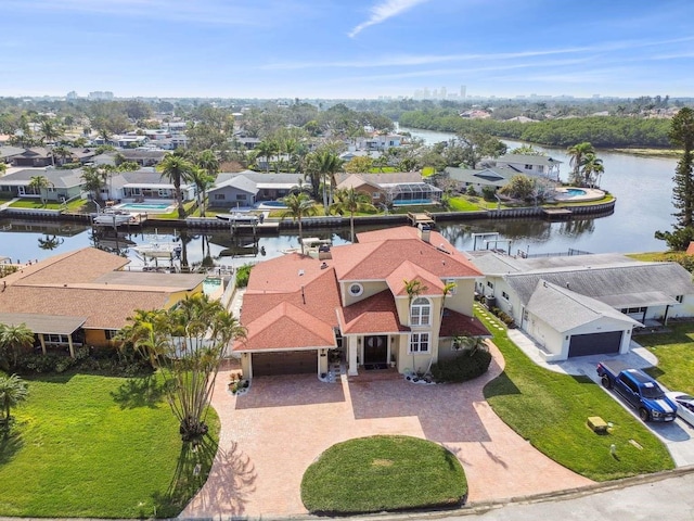 drone / aerial view featuring a water view