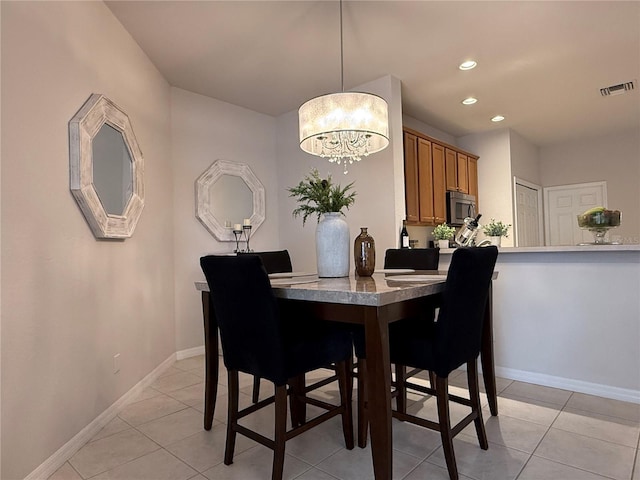 dining room with light tile patterned floors