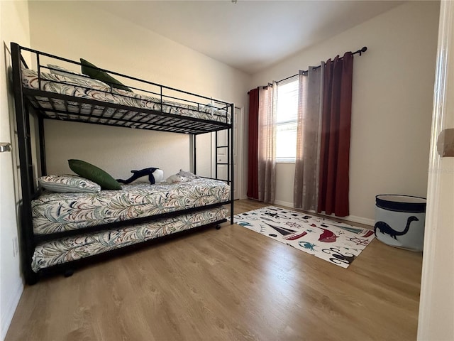 bedroom featuring hardwood / wood-style floors