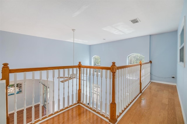 corridor featuring light hardwood / wood-style flooring