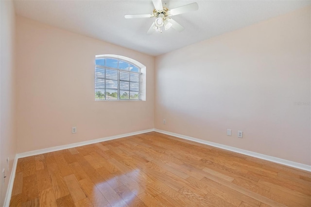 unfurnished room with ceiling fan and light hardwood / wood-style flooring