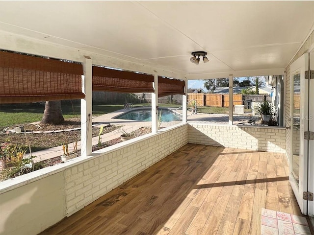 exterior space featuring a fenced in pool and a patio