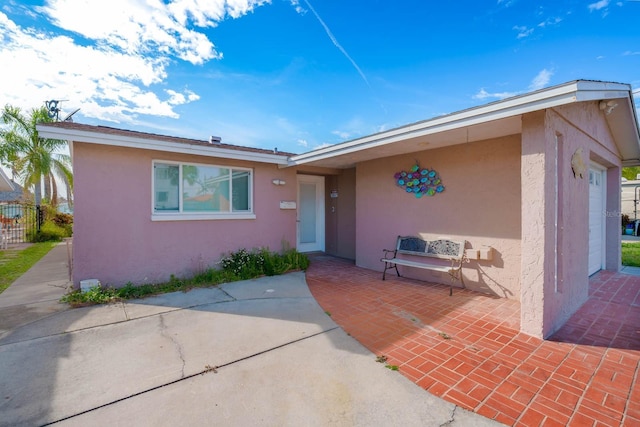 5033 Blue Heron Dr, New Port Richey, FL 34652 - view of front of property with a garage