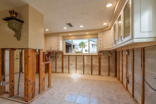 5033 Blue Heron Dr, New Port Richey, FL 34652 - interior space featuring light tile patterned flooring