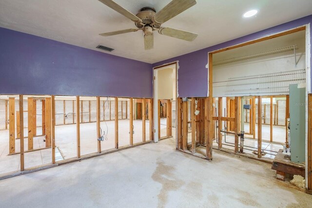 5033 Blue Heron Dr, New Port Richey, FL 34652 - spare room featuring concrete flooring and ceiling fan