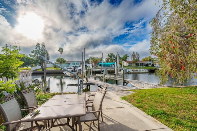 5033 Blue Heron Dr, New Port Richey, FL 34652 - view of dock with a water view and a yard