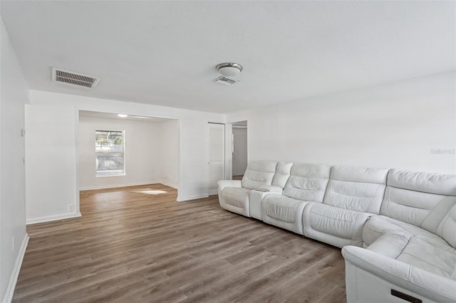 living room with hardwood / wood-style flooring