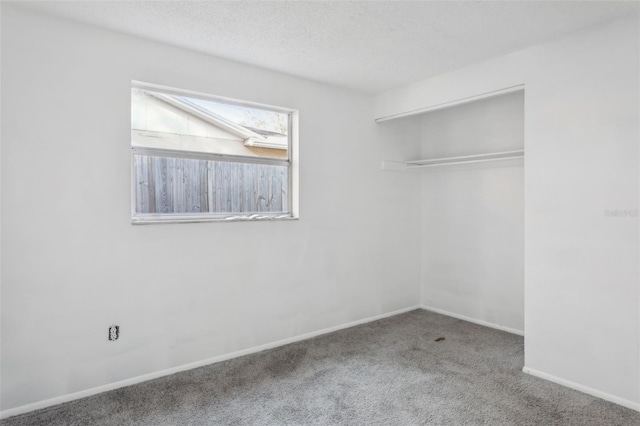 interior space featuring a textured ceiling