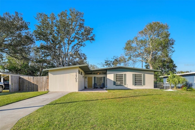 ranch-style house with a front lawn