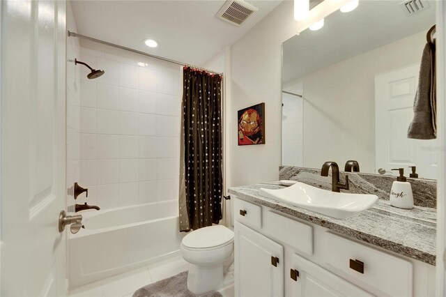 full bathroom featuring tile patterned flooring, visible vents, shower / tub combo, and toilet