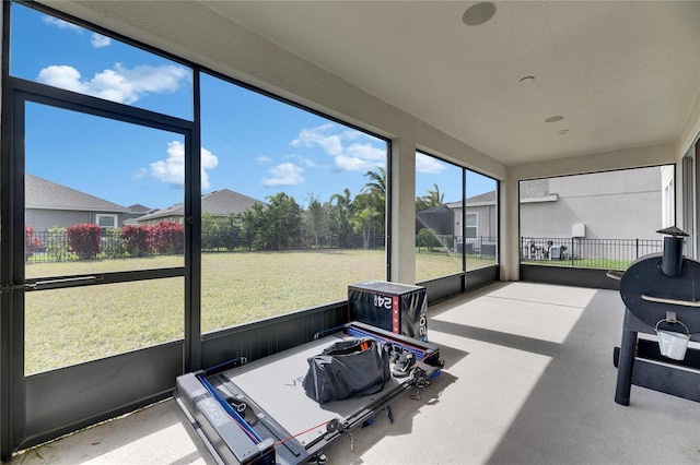 sunroom / solarium featuring a wealth of natural light