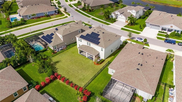 birds eye view of property with a residential view