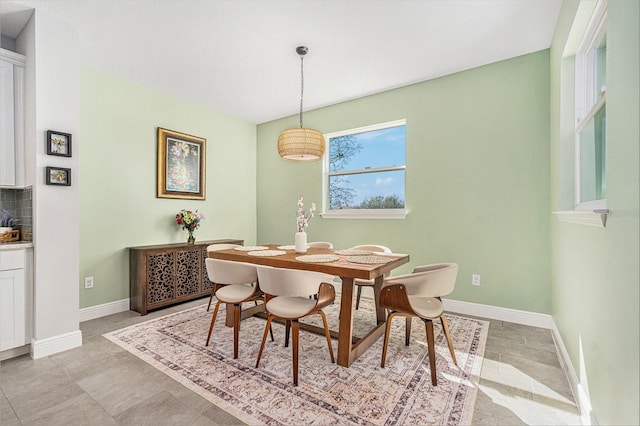 dining space with baseboards
