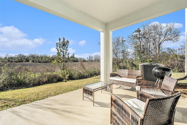 view of patio / terrace with outdoor lounge area and central AC