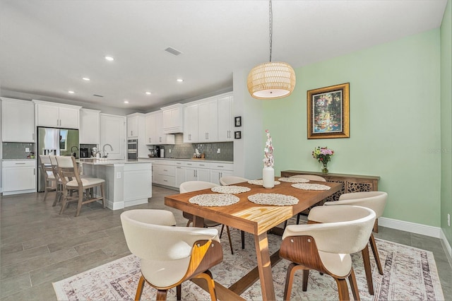22990 Scaglione Dr, Lutz, FL 33549 - dining area with recessed lighting and baseboards