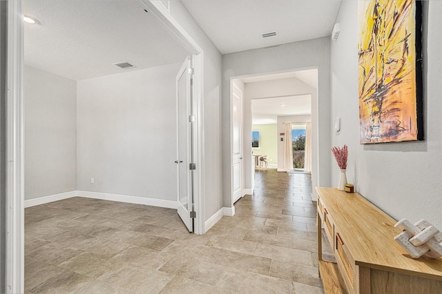 22990 Scaglione Dr, Lutz, FL 33549 - corridor featuring baseboards