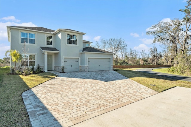 22990 Scaglione Dr, Lutz, FL 33549 - traditional home with driveway, stucco siding, stone siding, and an attached garage