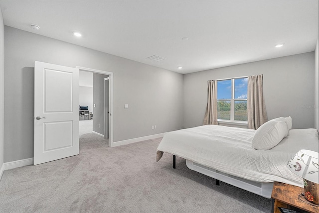 22990 Scaglione Dr, Lutz, FL 33549 - bedroom featuring light colored carpet and recessed lighting
