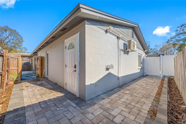 view of side of property featuring a patio