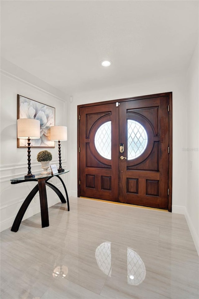 foyer featuring french doors