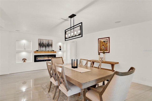 dining room with built in shelves