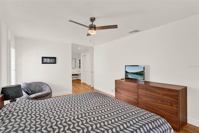 bedroom featuring ceiling fan and light wood-type flooring