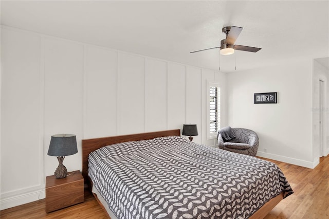 bedroom featuring ceiling fan and light wood-type flooring