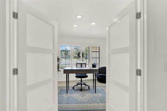 home office with a textured ceiling