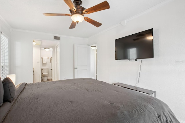 unfurnished bedroom featuring crown molding, ensuite bathroom, ceiling fan, and visible vents