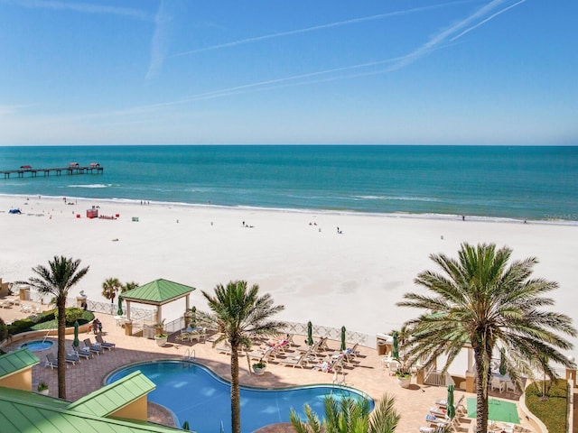 water view with a beach view and a gazebo