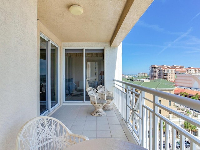 balcony featuring a sunroom