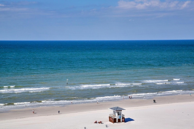 property view of water featuring a beach view