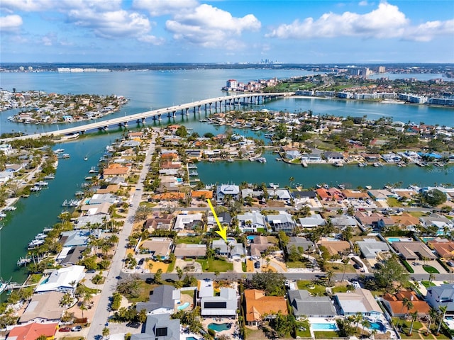 drone / aerial view with a water view